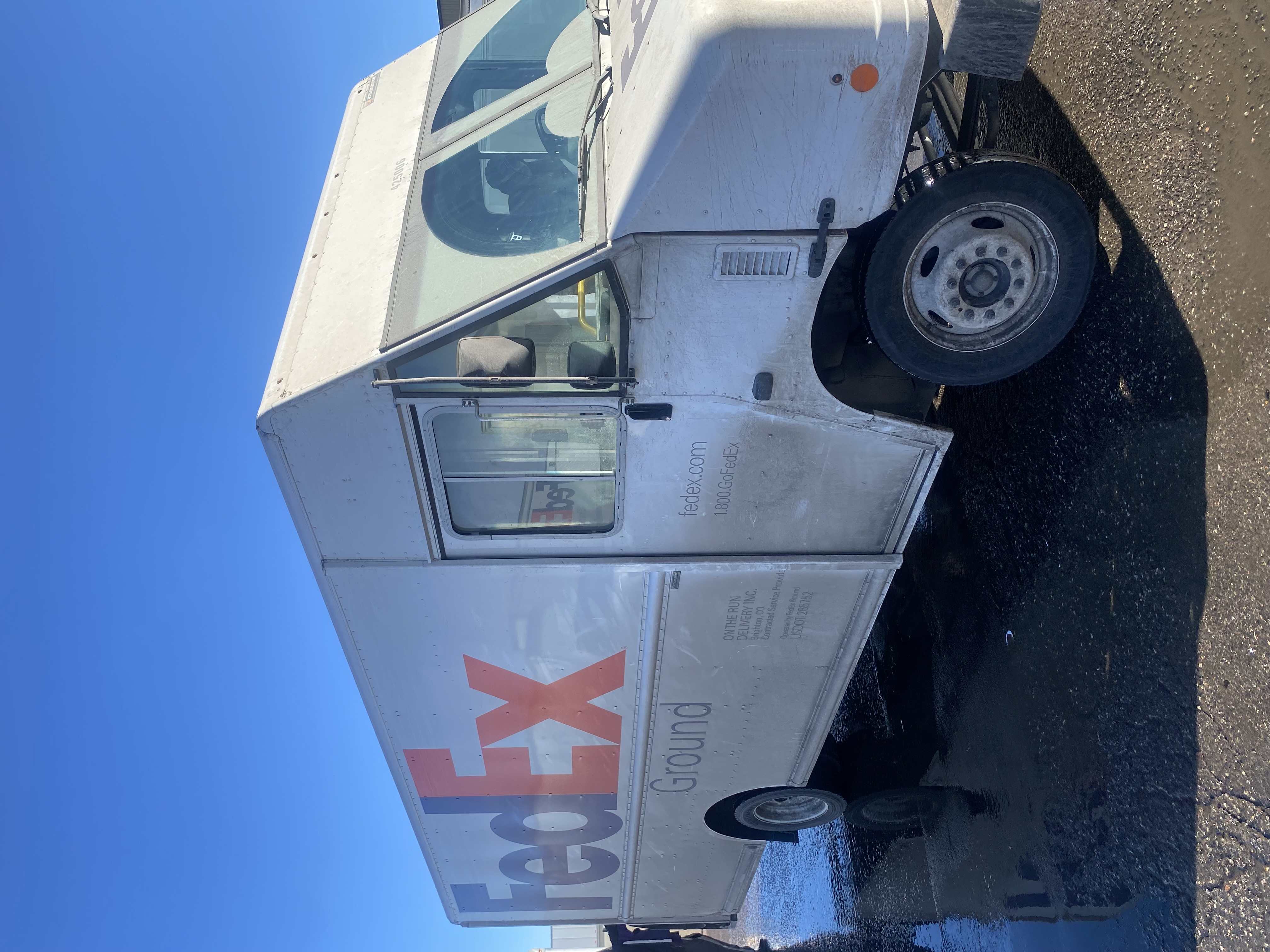 FedEx truck side before washing