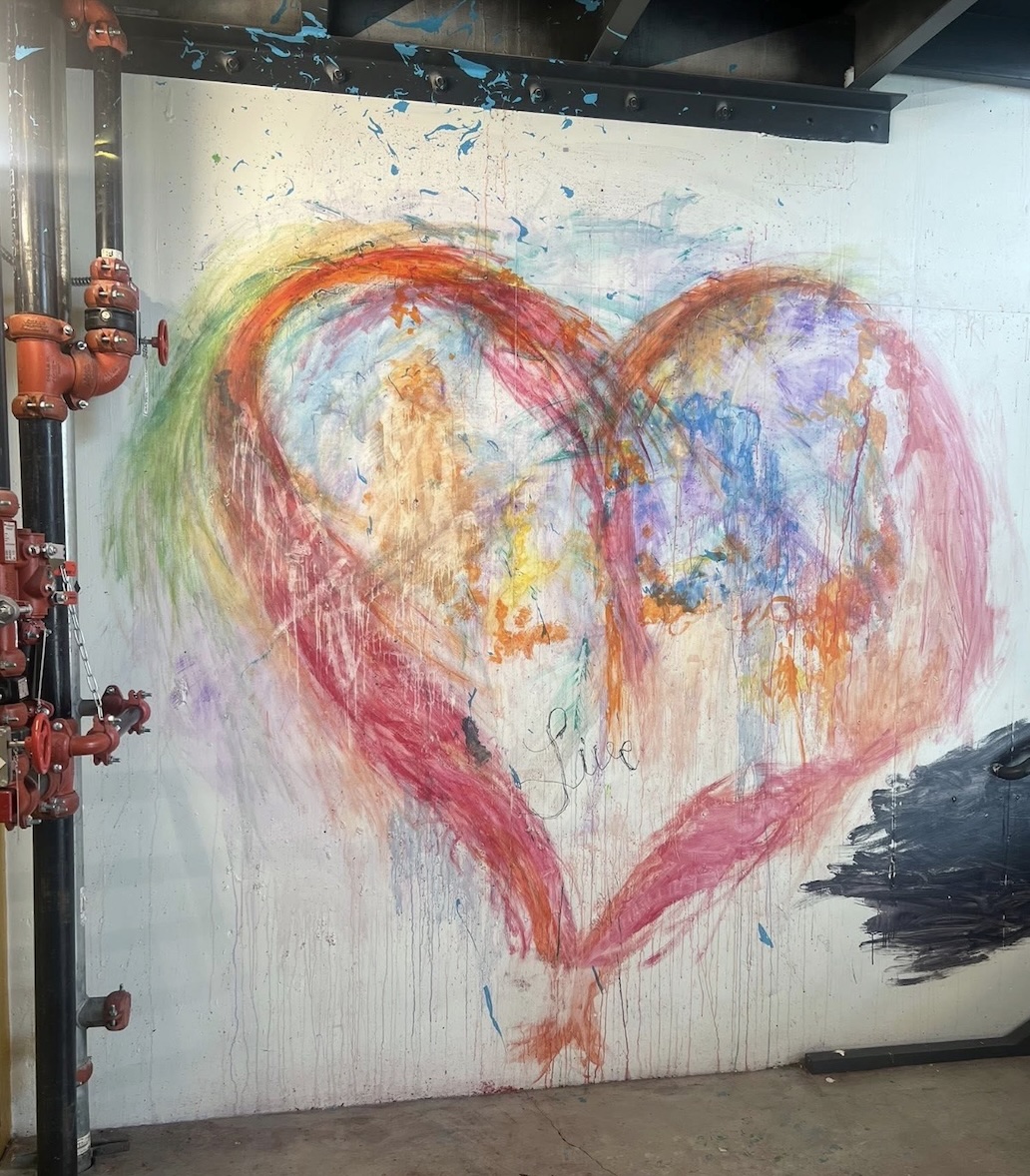 Wall with paint/mural before cleaning